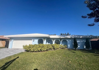 Welcome to this single-story residence in Boca Madera, located - photo 1