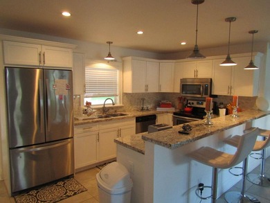 Welcome to this single-story residence in Boca Madera, located - photo 8