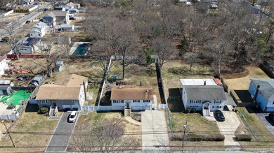 Welcome to 1081 Bay Shore Ave, a spacious Hi-Ranch home offering - photo 3