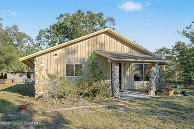 Set on 4.62 acres along a paved road, this 3BR/2BA country home - photo 3