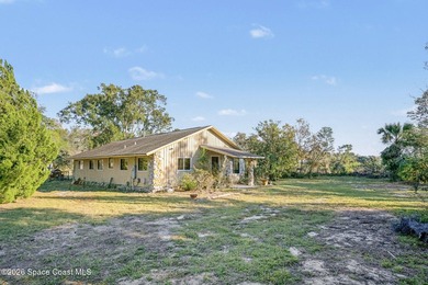 Set on 4.62 acres along a paved road, this 3BR/2BA country home - photo 4