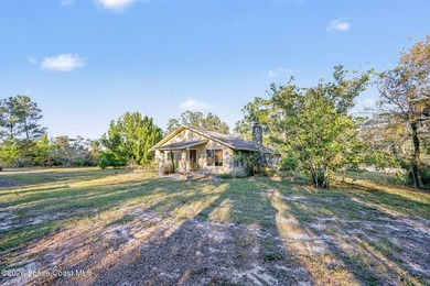 Set on 4.62 acres along a paved road, this 3BR/2BA country home - photo 5