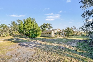 Set on 4.62 acres along a paved road, this 3BR/2BA country home - photo 6
