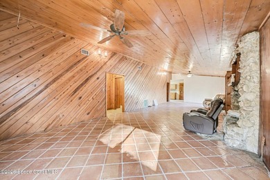 Set on 4.62 acres along a paved road, this 3BR/2BA country home - photo 10