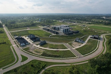 Welcome to Lakeshore Commons! This vacant lot is located in one - photo 5