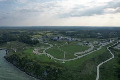 Welcome to Lakeshore Commons! This vacant lot is located in one - photo 6