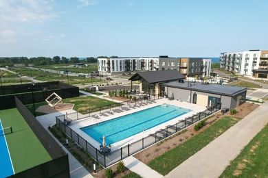 Welcome to Lakeshore Commons! This vacant lot is located in one - photo 9