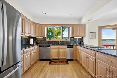 609 Point Charles Rd in Sunrise Beach offers luxury lakefront - photo 12