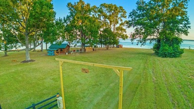 This rare 2-acre waterfront property captures one of the most - photo 12