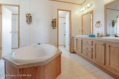 This charming 4-bedroom, 2-bath double wide offers stunning - photo 22