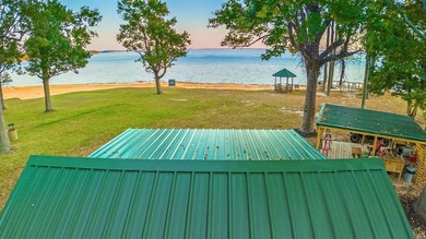 This rare 2-acre waterfront property captures one of the most - photo 39