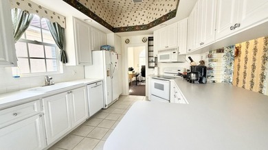 This well-designed home features 12-foot ceilings in the great - photo 7
