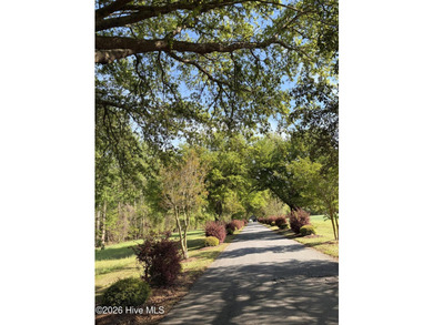 This vacant land of 1.68 acres is nestled in the picturesque - photo 2