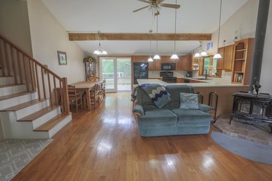 Nestled in the woods on beautifully landscaped grounds, this - photo 4