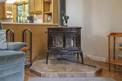 Nestled in the woods on beautifully landscaped grounds, this - photo 8