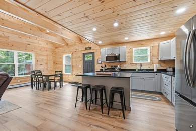 Discover the perfect blend of comfort, recreation, and Rangeley - photo 3