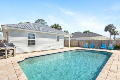 This well-located 3-bedroom, 2-bathroom home on the highly - photo 37