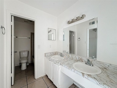 One or more photo(s) has been virtually staged. This spacious - photo 26