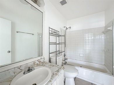 One or more photo(s) has been virtually staged. This spacious - photo 32