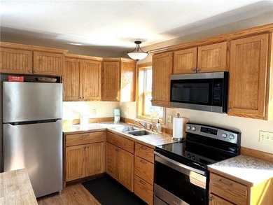 Enjoy lake views with this 1st tier property in Linn Valley - photo 11