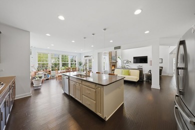 Set on a professionally landscaped lot of more than one-third - photo 20