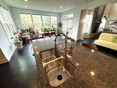 Set on a professionally landscaped lot of more than one-third - photo 21