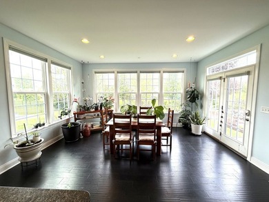 Set on a professionally landscaped lot of more than one-third - photo 25