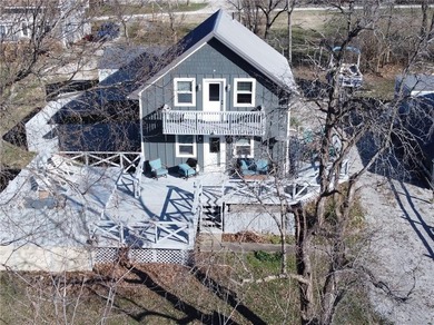 Enjoy lake views with this 1st tier property in Linn Valley - photo 31