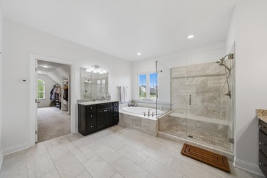 Set on a professionally landscaped lot of more than one-third - photo 33
