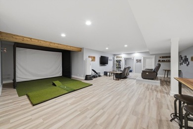 Set on a professionally landscaped lot of more than one-third - photo 42