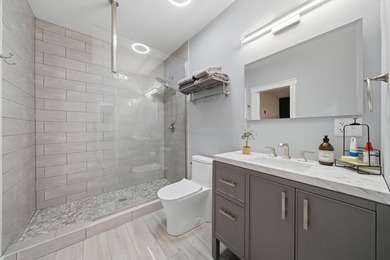 Set on a professionally landscaped lot of more than one-third - photo 45
