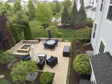 Set on a professionally landscaped lot of more than one-third - photo 46