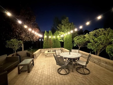 Set on a professionally landscaped lot of more than one-third - photo 49