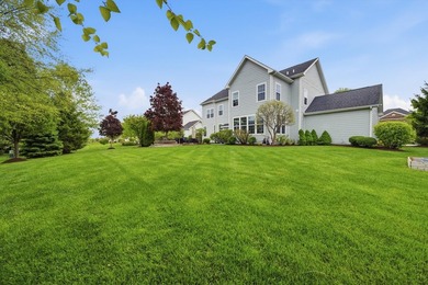 Set on a professionally landscaped lot of more than one-third - photo 50