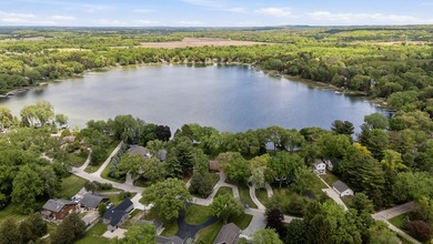 65 ft of level frontage on beautiful Pretty Lake with sunrise - photo 1