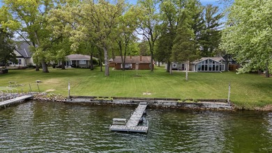 65 ft of level frontage on beautiful Pretty Lake with sunrise - photo 4