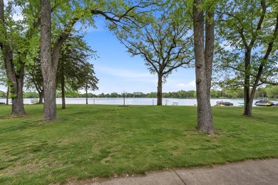 65 ft of level frontage on beautiful Pretty Lake with sunrise - photo 7
