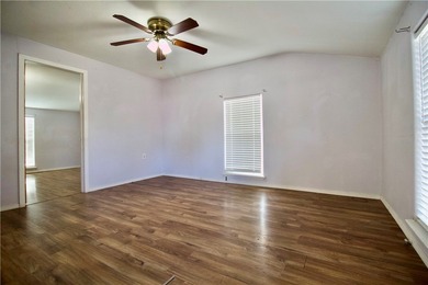 What an amazing corner-lot opportunity! This 3-bedroom, 1.5-bath