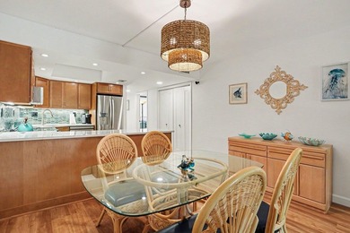 Just a short walk to the beach, this updated second-floor condo - photo 13