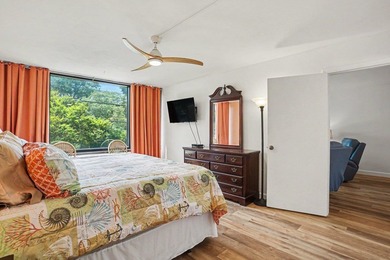 Just a short walk to the beach, this updated second-floor condo - photo 24