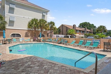Just a short walk to the beach, this updated second-floor condo - photo 27