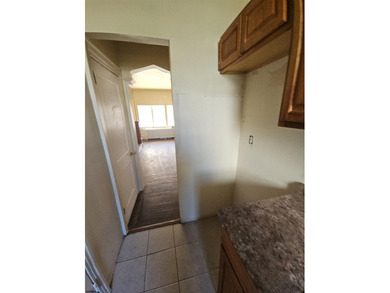 Prime Location with Exceptional Potential! This 3-bedroom - photo 11