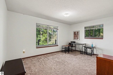 Nestled on 99 feet of Van Ettan Lake frontage and surrounded by - photo 11