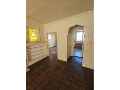 Prime Location with Exceptional Potential! This 3-bedroom - photo 14