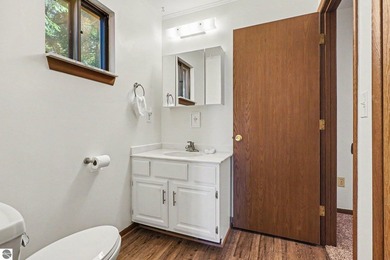 Nestled on 99 feet of Van Ettan Lake frontage and surrounded by - photo 14