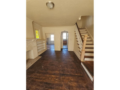 Prime Location with Exceptional Potential! This 3-bedroom - photo 16