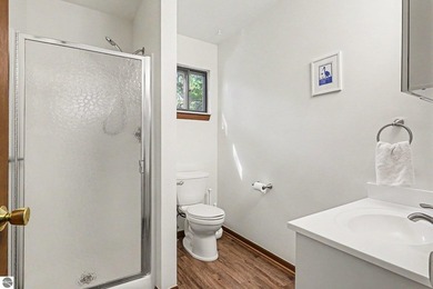 Nestled on 99 feet of Van Ettan Lake frontage and surrounded by - photo 16