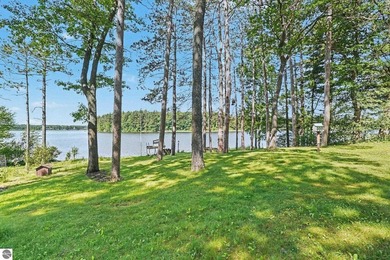 Nestled on 99 feet of Van Ettan Lake frontage and surrounded by - photo 24