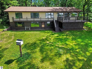 Nestled on 99 feet of Van Ettan Lake frontage and surrounded by - photo 25