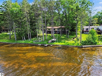 Nestled on 99 feet of Van Ettan Lake frontage and surrounded by - photo 27